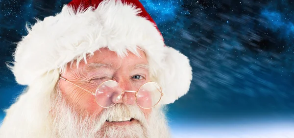 Složený obraz santa claus mrkání — Stock fotografie