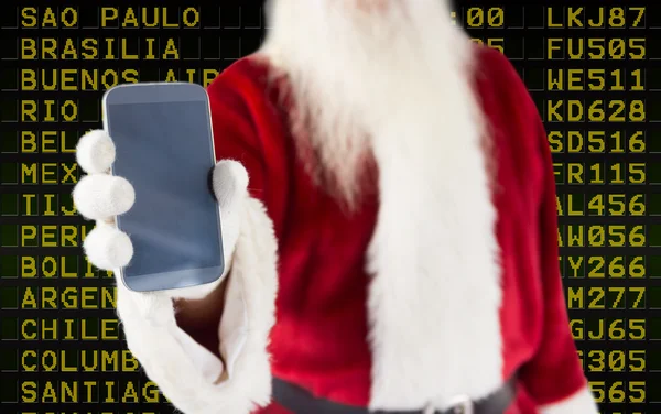 Santa Claus visar smartphone — Stockfoto