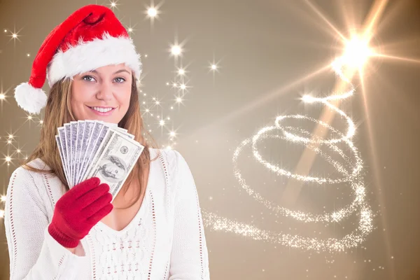 Festlig blondin visar fan dollar — Stockfoto