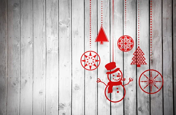 Composite image of hanging red christmas decorations — Stock Photo, Image