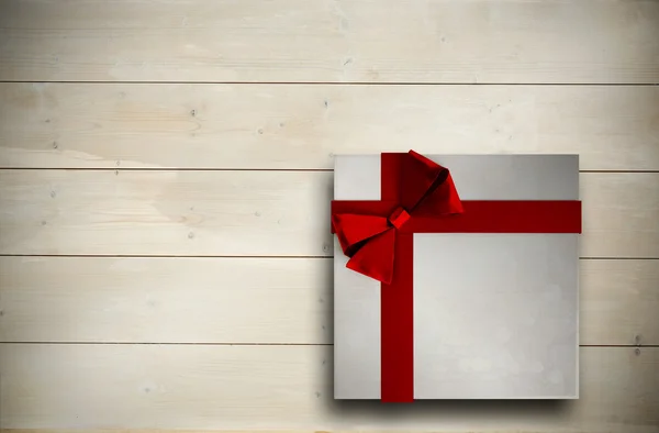 Composite image of christmas present with bow — Stock Photo, Image