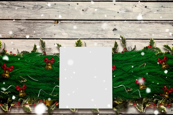 Composite image of fir branch christmas decoration garland — Stock Photo, Image