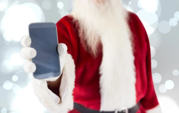 Santa Claus mostrando smartphone —  Fotos de Stock