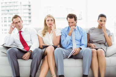 Nervous executives waiting for interview clipart