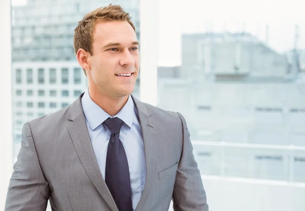 Smart young businessman in suit — Stock Photo, Image