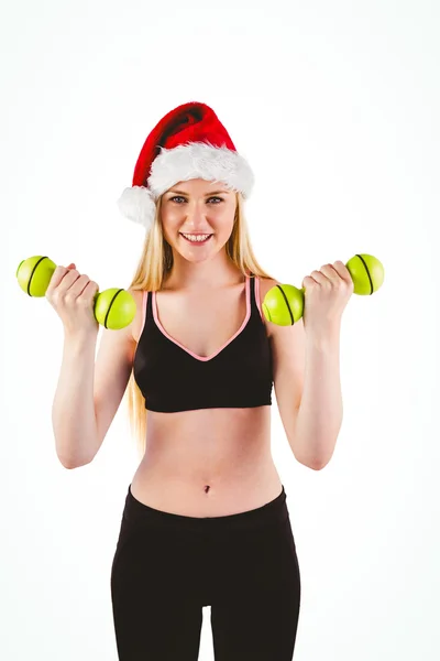 Festive fit blonde smiling at camera — Stock Photo, Image