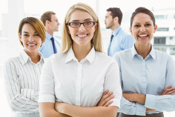 Young businesswomen with arms crossed — Stock Photo, Image