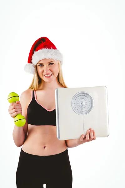 Festive fit bionda sorridente alla fotocamera — Foto Stock