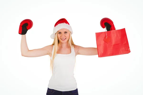 Festive blonde cheering with boxing gloves — Stock Photo, Image