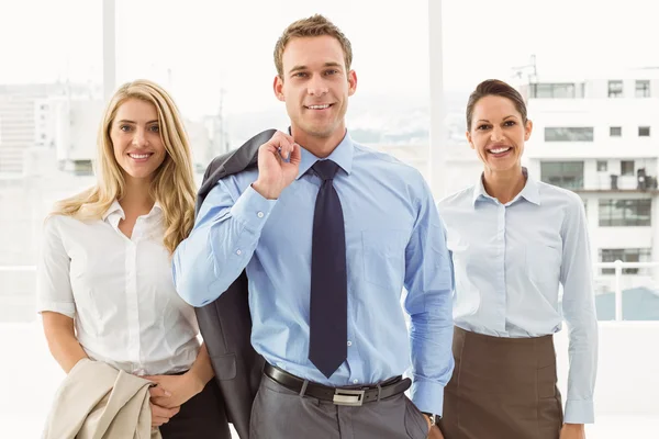 Happy young business people in office — Stock Photo, Image