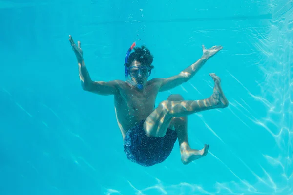 Young man wearing snorkel underwater — Stock Photo, Image