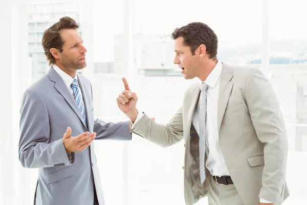 Business colleagues in argument at office — Stock Photo, Image