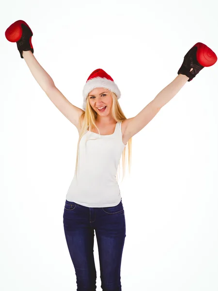 Festive blonde cheering with boxing gloves — Stock Photo, Image