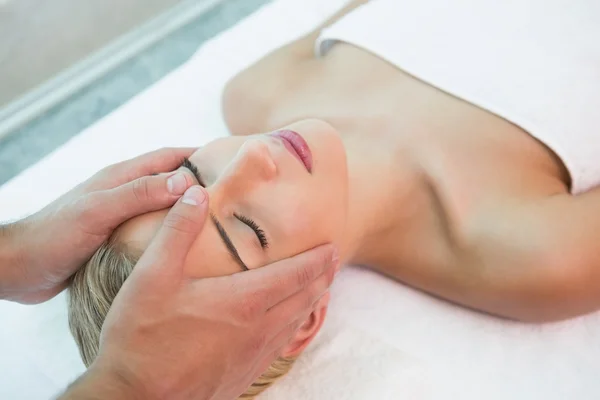 Attractive woman receiving head massage — Stock Photo, Image