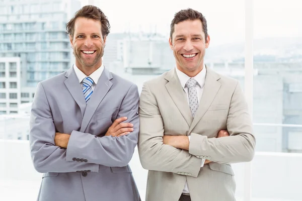 Confident happy businessmen in office — Stock Photo, Image