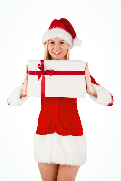 Festive blonde holding a gift — Stock Photo, Image