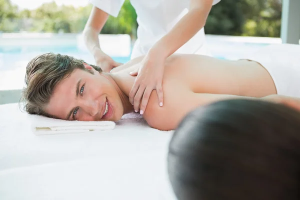 Couple enjoying massage at health farm — Stock Photo, Image