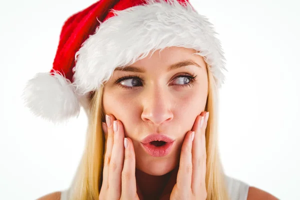 Bionda festiva che sembra sorpresa con le mani sul viso — Foto Stock