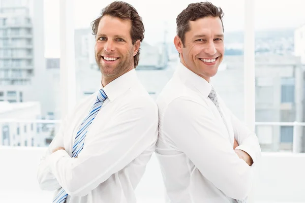 Confident happy businessmen in office — Stock Photo, Image