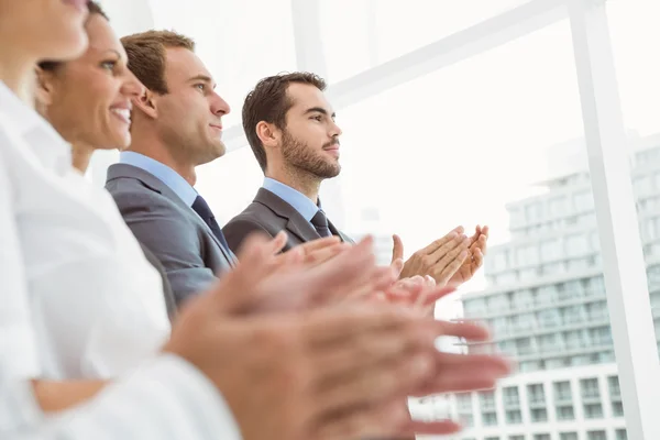 Business people clapping hands in office — Stock Photo, Image