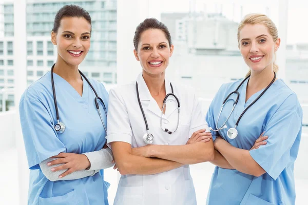 Portrait of female doctors with arms crossed Stock Image