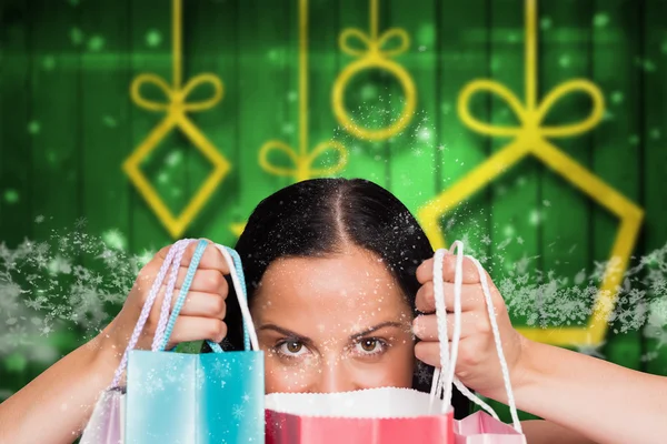 Samengestelde afbeelding van vrouw met shopping tassen — Stockfoto