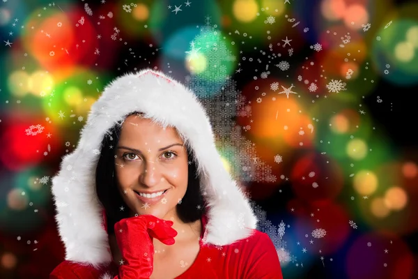 Samengestelde afbeelding van vrouw die lacht op de camera — Stockfoto