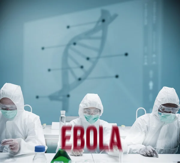 Chemists working in protective suit with futuristic interface — Stock Photo, Image