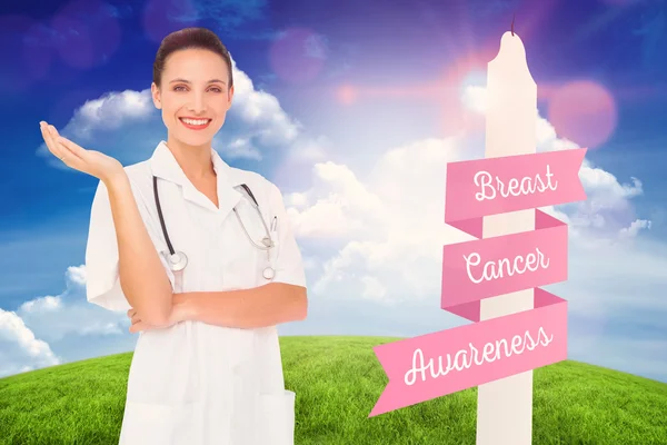 Doctor with breast cancer awareness message — Stock Photo, Image