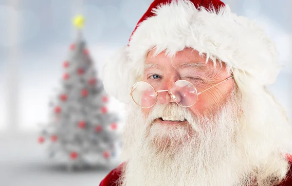 Composite image of santa claus winking — Stock Photo, Image