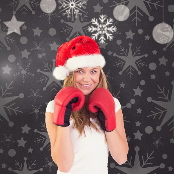 Loira festiva com luvas de boxe — Fotografia de Stock