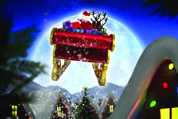 Composite image of santa flying his sleigh — Stock Photo, Image