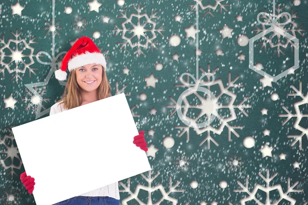 Festive blonde holding a poster — Stock Photo, Image