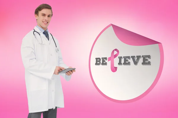 Doctor with breast cancer awareness message — Stock Photo, Image