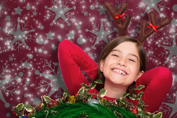 Image composite de petite fille festive portant des bois — Photo