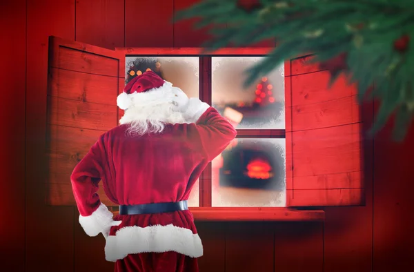 Imagen compuesta de santa claus — Foto de Stock