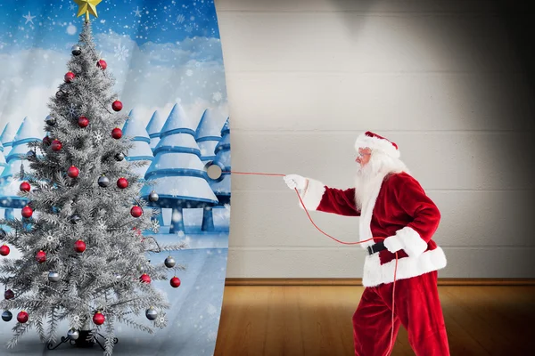 Immagine composita di Babbo Natale tira qualcosa con una corda — Foto Stock