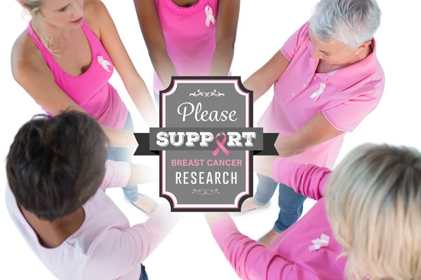 Mujeres vestidas de rosa y cintas para el cáncer de mama —  Fotos de Stock