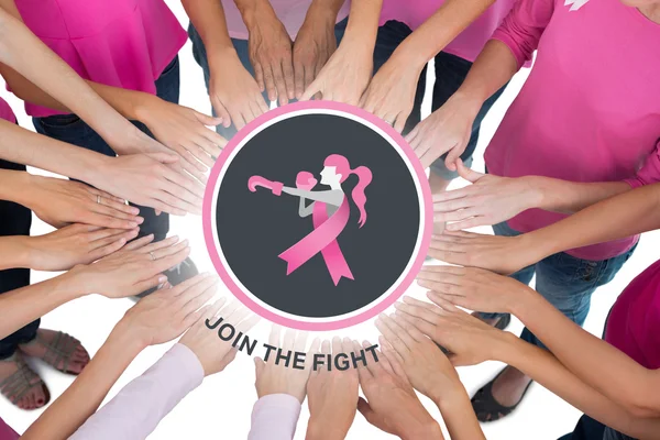 Hands joined in circle wearing pink for breast cancer — Stock Photo, Image