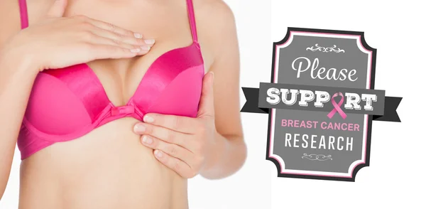 Composite image of woman performing self breast examination — Stock Photo, Image