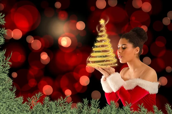 Santa ragazza che soffia sulle sue mani — Foto Stock