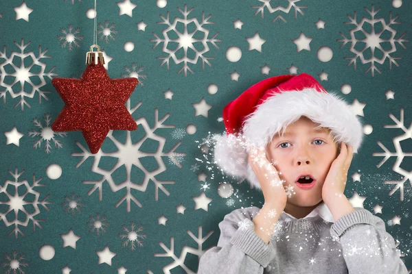 Imagen compuesta de niño sorprendido festivo — Foto de Stock