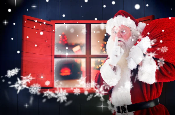 Złożony obraz Świętego Mikołaja prowadzenie worek — Zdjęcie stockowe