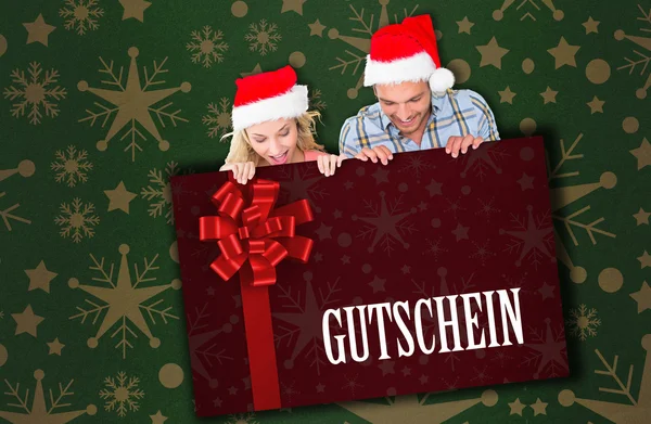 Composite image of young festive couple — Stock Photo, Image