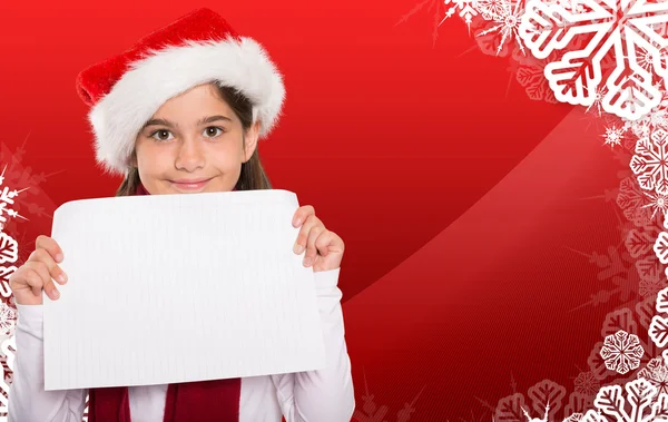 Composite image of festive little girl showing card — Stock Photo, Image