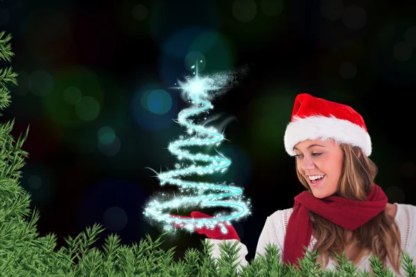 Festive blonde presenting with hand — Stock Photo, Image