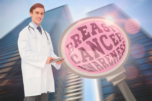 Doctor with breast cancer awareness message — Stock Photo, Image