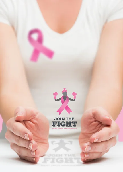 Woman presenting breast cancer awareness message — Stock Photo, Image