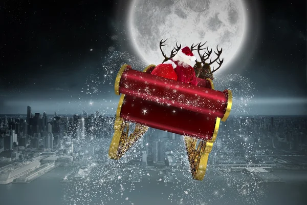 Composite image of santa flying his sleigh — Stock Photo, Image