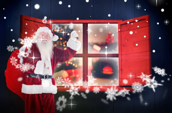 Imagem composta de Papai Noel tocando sino — Fotografia de Stock